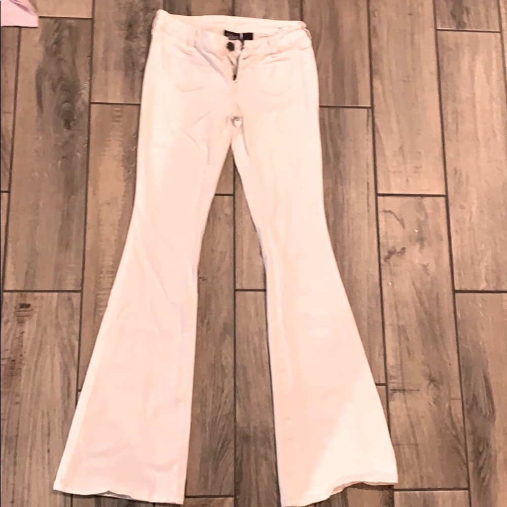 Like new city streets white flare jeans